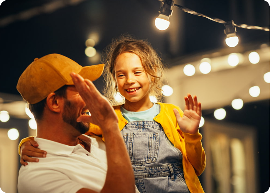 Parent and Child High-Fiving
